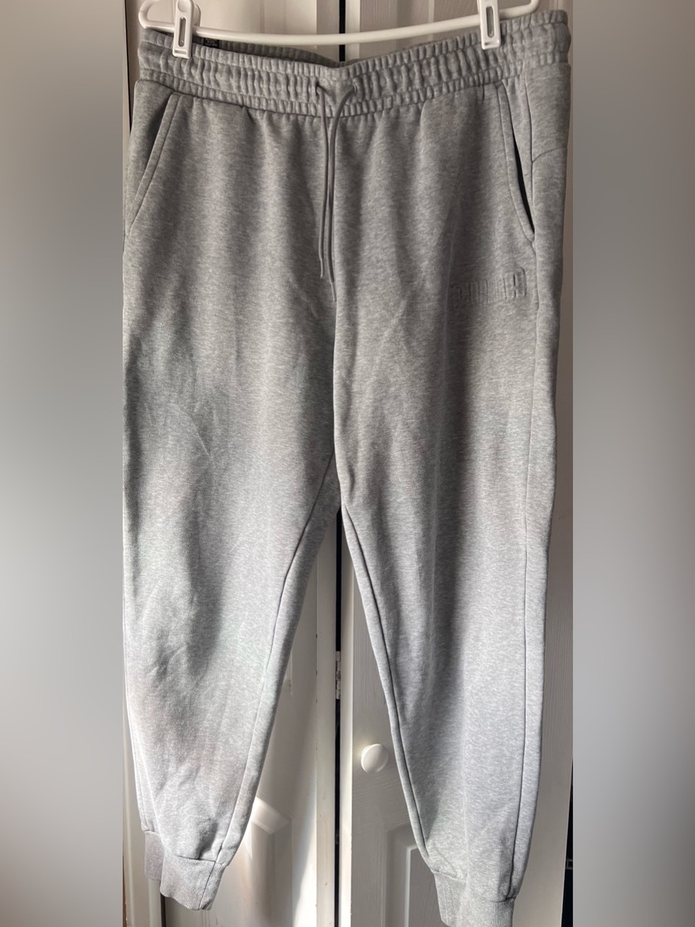 PUMA Men's Embossed Logo Fleece Jogger Gray Sweatpants